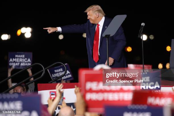 President Donald Trump speaks at an airport hanger at a rally a day after he formally accepted his party’s nomination at the Republican National...