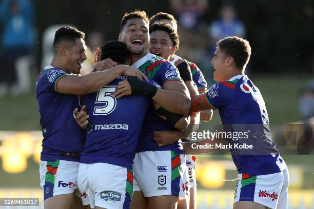 George Jennings of the Warriors celebrates after scoring a try during the round 16 NRL match between the New Zealand Warriors and the Newcastle...