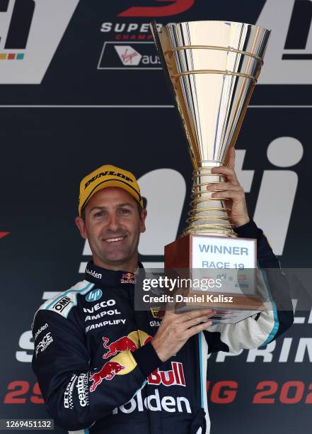 Jamie Whincup driver of the Red Bull Holden Racing Team Holden Commodore ZB celebrates after winning race 19 during the Townsville SuperSprint round...