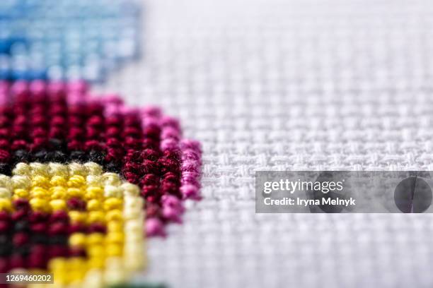 embroidered good by cross stitch pattern - cross stitch stock pictures, royalty-free photos & images