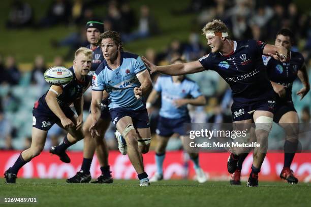 Michael Hooper of the Waratahs passes during the round nine Super Rugby AU match between the Waratahs and the Melbourne Rebels at Leichhardt Oval on...