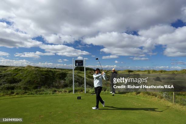 Joe Long of England tee's off at the 8th in his quarter final match against Barclay Brown of during day five of The Amateur Championship at Royal...
