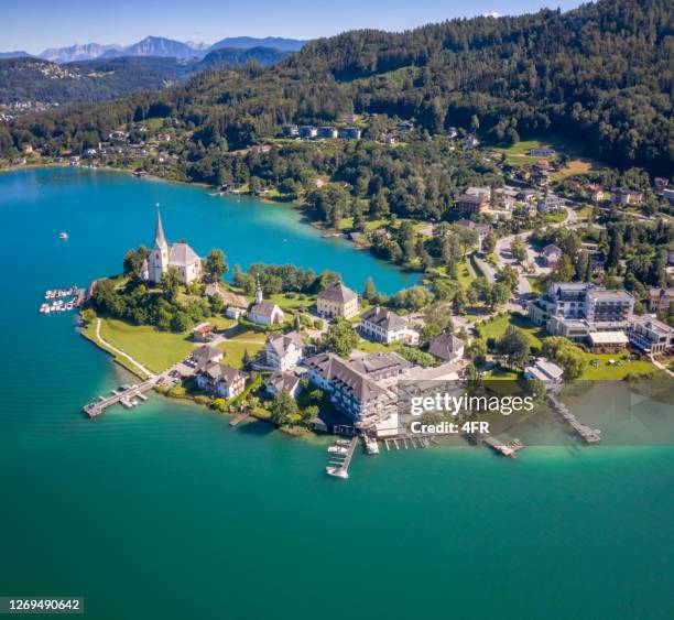 maria wörth peninsula, klagenfurt, wörthersee, austria - woerthersee stock pictures, royalty-free photos & images