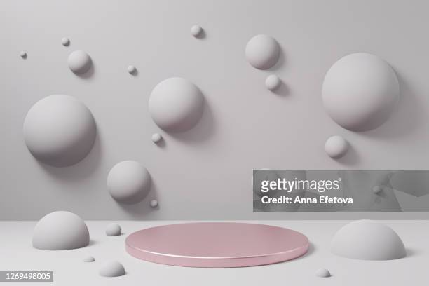 rose gold podium on white background with spheres. - matte finish stock pictures, royalty-free photos & images
