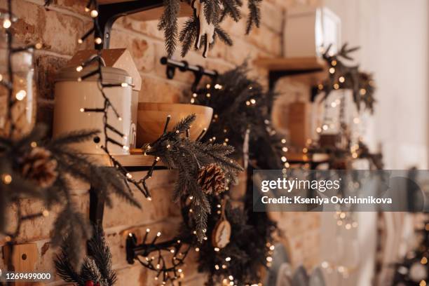 blur christmas lights on wooden planks, low depth of focus with copyspace - garland decoration stock pictures, royalty-free photos & images