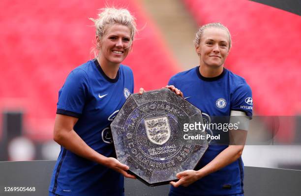 Millie Bright and Magdalena Erkisson of Chelsea celebrate with the Community Shield Trophy following her team's victory in the Women's FA Community...