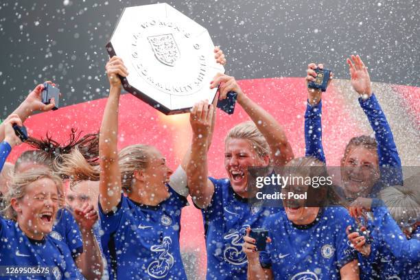 Magdalena Erkisson of Chelsea lifts the Community Shield Trophy following her team's victory in during the Women's FA Community Shield Final at...