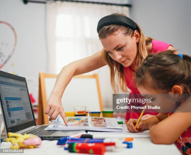 little girl during private lesson - baby sitting studio stock pictures, royalty-free photos & images
