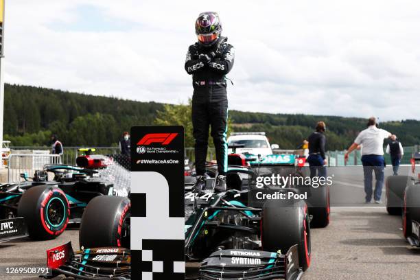 Pole position qualifier Lewis Hamilton of Great Britain and Mercedes GP celebrates in parc ferme during qualifying for the F1 Grand Prix of Belgium...