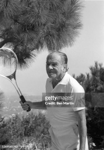 Actor Lionel Stander at home on the tennis court in Los Angeles, August 18, 1982.