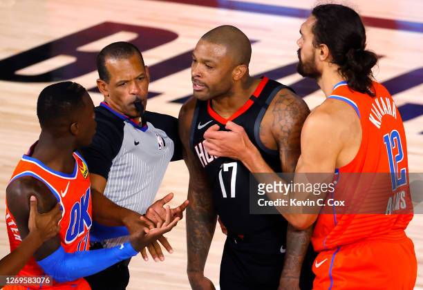 Tucker of the Houston Rockets is held back by Steven Adams of the Oklahoma City Thunder and referee Eric Lewis after head butting Dennis Schroder of...