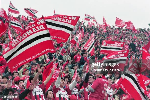 Urawa Red Diamonds supporters cheer prior to the J.League Nicos Series match between Urawa Red Diamonds and Shimizu S-Pulse at the National Stadium...