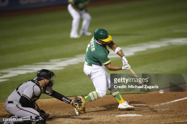 Franklin Barreto of the Oakland Athletics bats during the game against the Arizona Diamondbacks at RingCentral Coliseum on August 20, 2020 in...