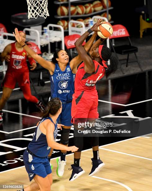 Elizabeth Williams of the Atlanta Dream looks to shoot the ball as Napheesa Collier of the Minnesota Lynx defends during the first half at Feld...