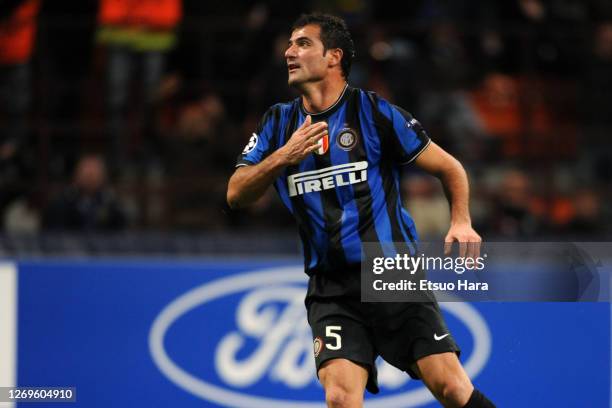 Dejan Stankovic of Inter Milan celebrates scoring his side"u2019s first goal during the UEFA Champions League Group F match between Inter Milan and...