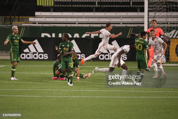 Sam Johnson of Real Salt Lake celebrates after scoring a goal in the 95th minute to tie the game 4-4 against the Portland Timbers at Providence Park...