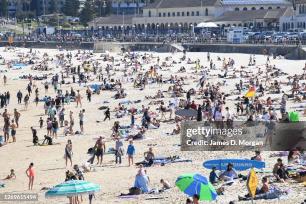 Hundreds of people enjoying the sun at Bondi Beach on August 30, 2020 in Sydney, Australia. Warm winter weather is being enjoyed across the entire...