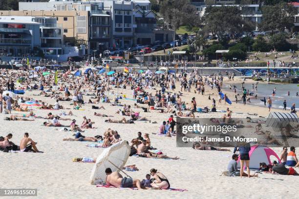 Hundreds of people enjoying the sun at Bondi Beach on August 30, 2020 in Sydney, Australia. Warm winter weather is being enjoyed across the entire...