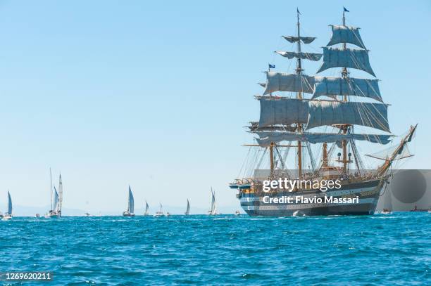 the italian navy sail ship "amerigo vespucci" enters the  harbour of taranto, italy; - amerigo vespucci nave stock pictures, royalty-free photos & images