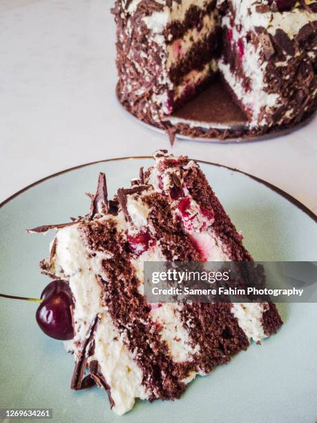 close-up of a black forest cake slice - black forest gateau stock pictures, royalty-free photos & images