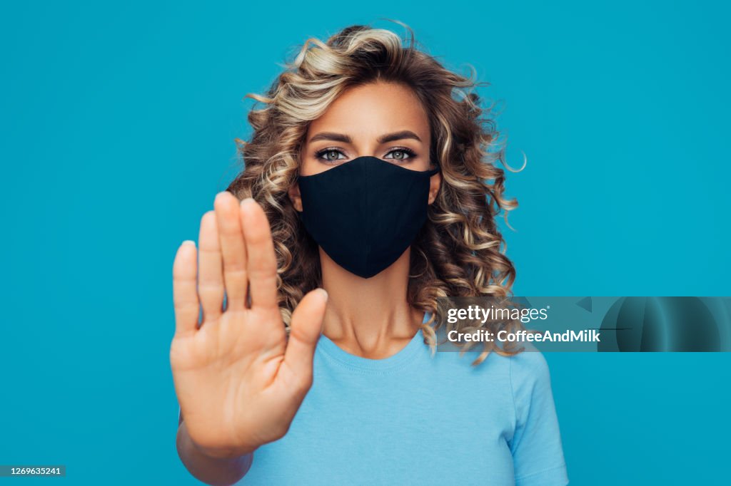 Short Stop Mask Girl In Black Protective Mask With Stop Symbol High-Res Stock Photo ...