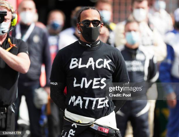 Lewis Hamilton of Great Britain and Mercedes GP takes part in a minute of silence in tribute to the late Anthoine Hubert before the F1 Grand Prix of...