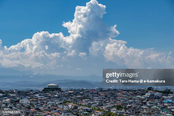 summer clouds on the residential district in kanagawa prefecture of japan - dark cloud stock pictures, royalty-free photos & images