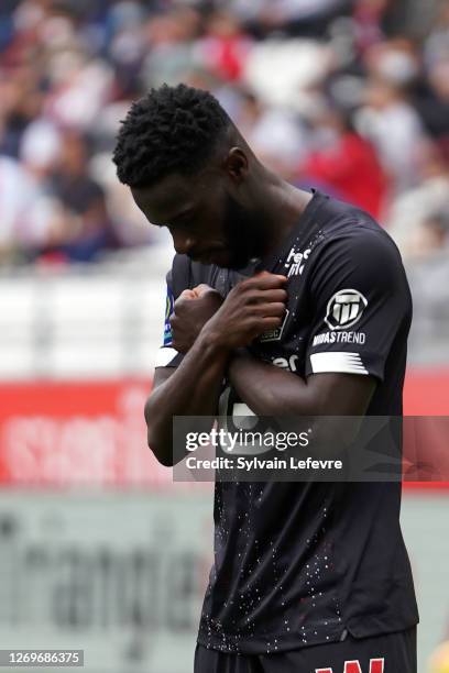 Jonathan Bamba of Lille celebrates by crossing his arms in the Wakanda salute after scoring 1st goal during the Ligue 1 match between Stade Reims and...