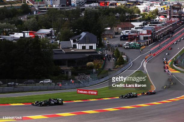 Lewis Hamilton of Great Britain driving the Mercedes AMG Petronas F1 Team Mercedes W11 leads the field at the start of the race during the F1 Grand...