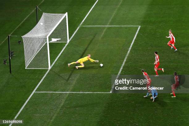 Tom Glover of Melbourne City stops a shot at goal by Adam Le Fondre of Sydney FC during the 2020 A-League Grand Final match between Sydney FC and...