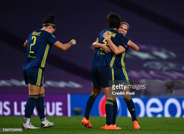 Saki Kumagai of Olympique Lyon celebrates with teammate Eugenie Le Sommer after scoring her team's second goal during the UEFA Women's Champions...