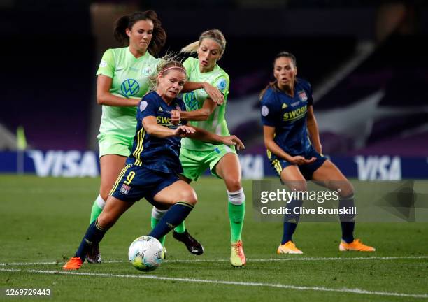 Eugenie Le Sommer of Olympique Lyon is challenged by Kathrin-Julia Hendrich of VfL Wolfsburg during the UEFA Women's Champions League Final between...