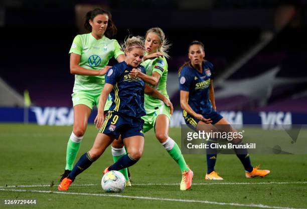 Eugenie Le Sommer of Olympique Lyon is challenged by Kathrin-Julia Hendrich of VfL Wolfsburg during the UEFA Women's Champions League Final between...
