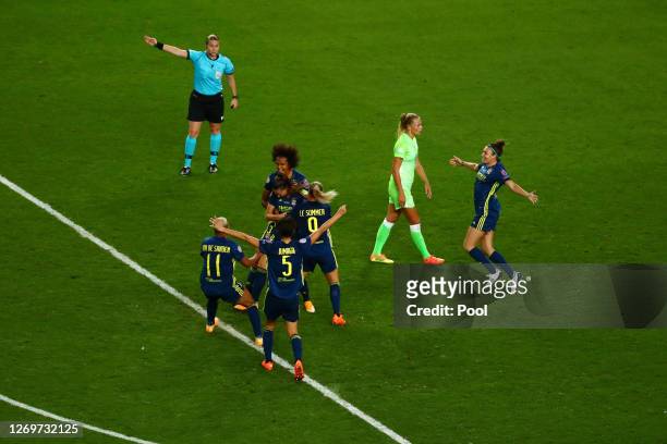 Sara Bjork Gunnarsdottir of Olympique Lyon celebrates with teammates after scoring her team's third goal during the UEFA Women's Champions League...