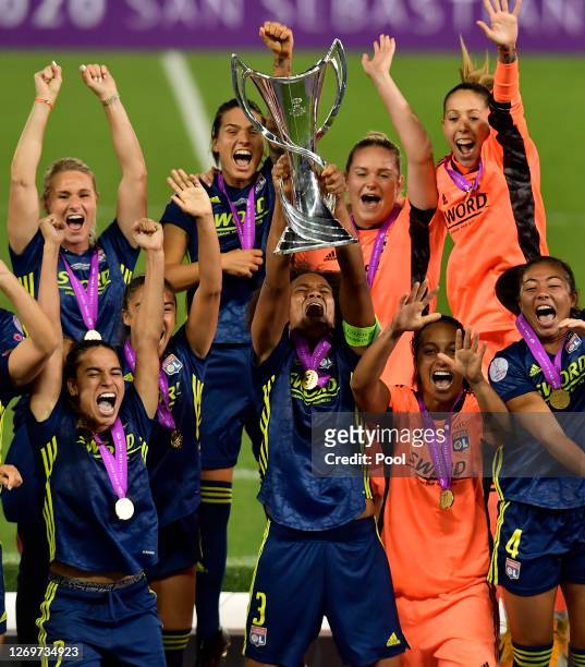 Wendie Renard, captain of Olympique Lyon lifts the UEFA Women's Champions League Trophy following her team's victory in the UEFA Women's Champions...