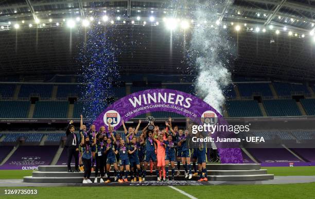 Wendie Renard, captain of Olympique Lyon lifts the UEFA Women's Champions League Trophy following her team's victory in the UEFA Women's Champions...