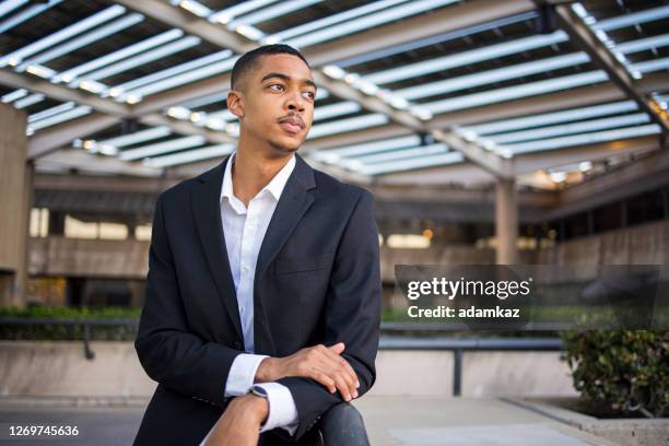 closeup portrait of a young black man - broader stock pictures, royalty-free photos & images