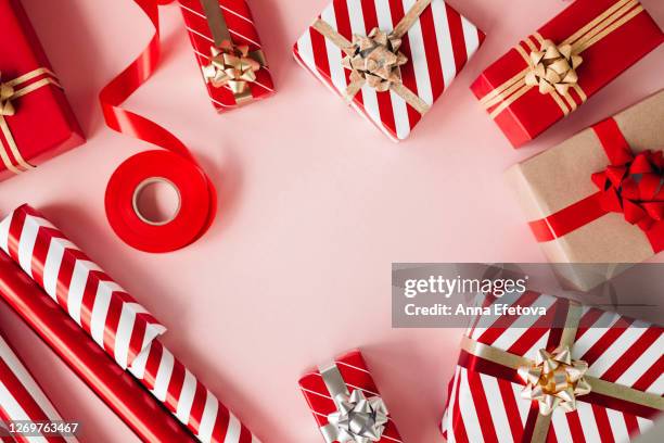 frame made of gift boxes on pastel background - christmas flatlay stock pictures, royalty-free photos & images