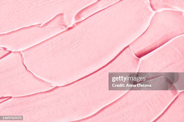 smears of gel on pink background - blood serum stock pictures, royalty-free photos & images