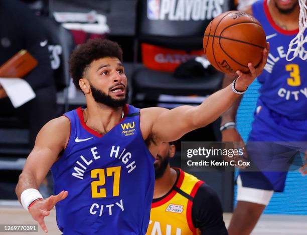 Jamal Murray of the Denver Nuggets goes up for a shot against the Utah Jazz during the first quarter in Game Six of the Western Conference First...