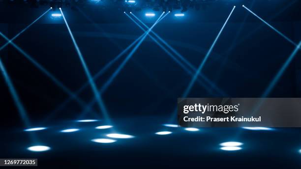 concert lighting on black abstract background - spotlit stock pictures, royalty-free photos & images