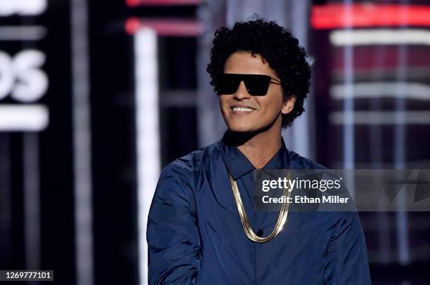 Recording artist Bruno Mars speaks during the 2018 Billboard Music Awards at MGM Grand Garden Arena on May 20, 2018 in Las Vegas, Nevada.