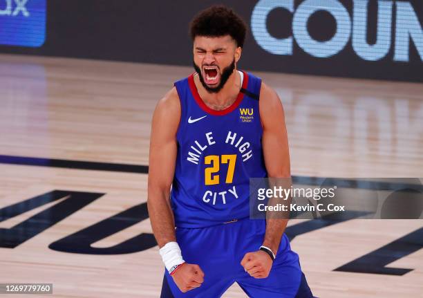 Jamal Murray of the Denver Nuggets reacts after shooting a three point basket against the Utah Jazz during the fourth quarter in Game Six of the...