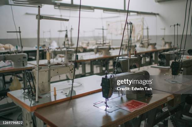 fashion design college classroom workshop with sewing machine - garment factory stock pictures, royalty-free photos & images