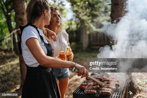 outdoor party - grill friends and beer stock pictures, royalty-free photos & images