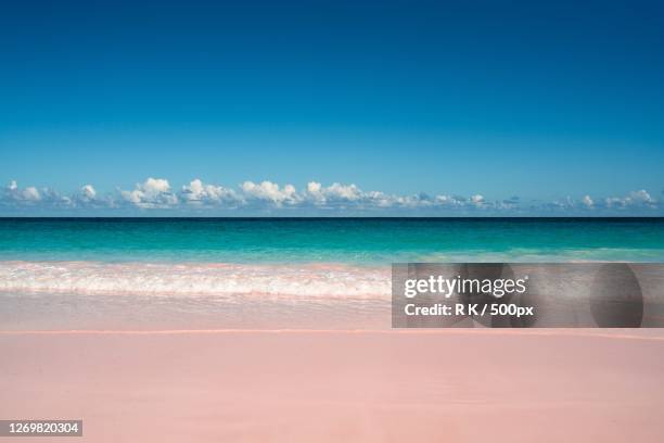 scenic view of sea against blue sky, dunmore town, bahamas - briland stock pictures, royalty-free photos & images