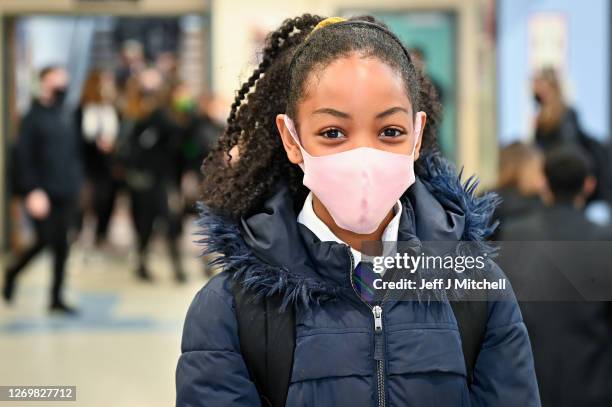 Pupils at Rosshall Academy wear face coverings as it becomes mandatory in corridors and communal areas on August 31, 2020 in Glasgow, Scotland. New...