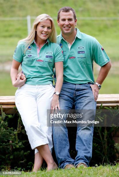 Autumn Kelly and Peter Phillips pose for photographs following their engagement announcement as they attend the Festival of British Eventing at...