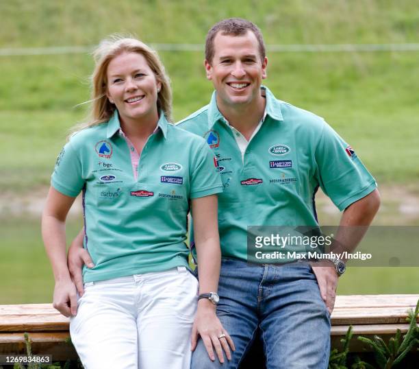Autumn Kelly and Peter Phillips pose for photographs following their engagement announcement as they attend the Festival of British Eventing at...