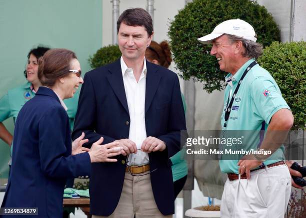 Princess Anne, Princess Royal talks with husband Vice Admiral Timothy Laurence and ex-husband Mark Phillips as they attend the Festival of British...